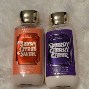 Bath & Body Works Snowy Citrus Swirl and Merry Cherry Cheer Lotion Duo